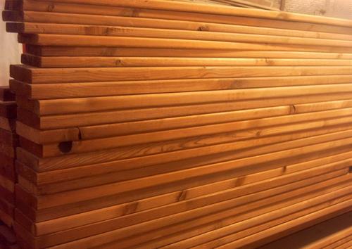 哈尔滨防腐木厂家：会造成防腐木屋木材变色的原因